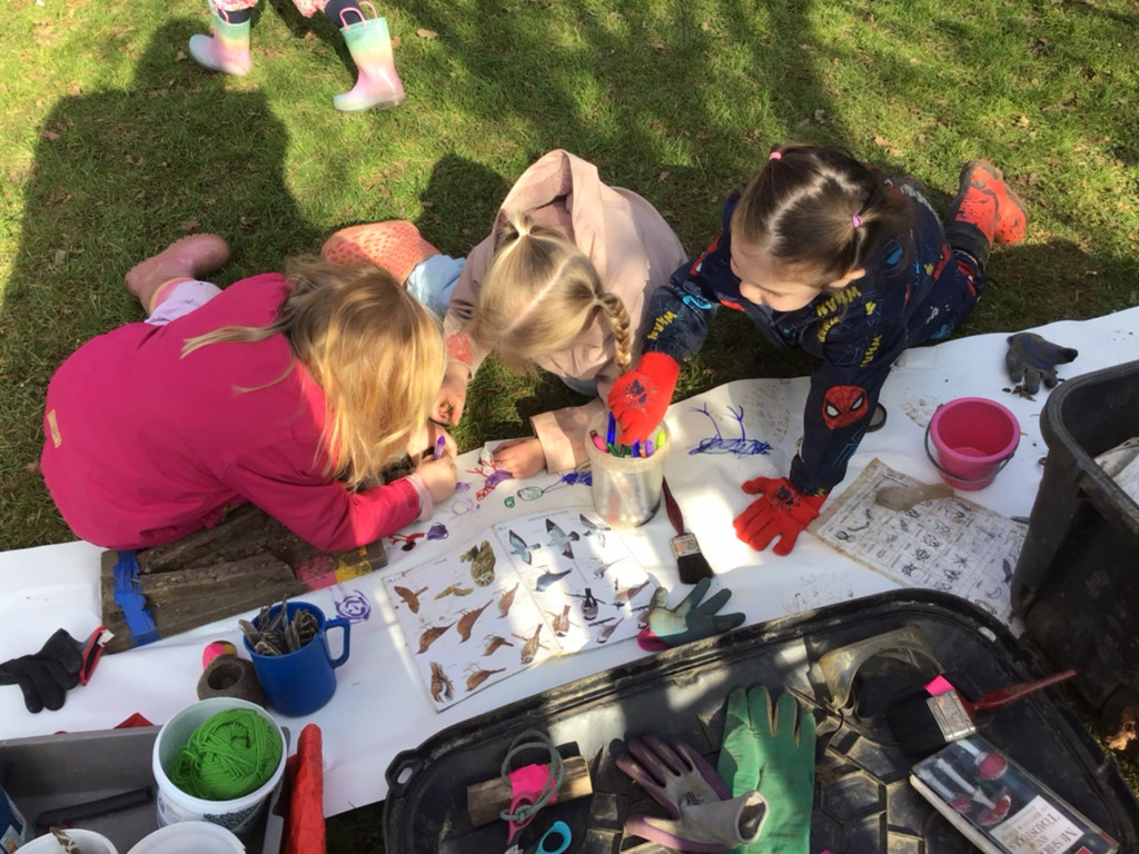 Children drawing birds
